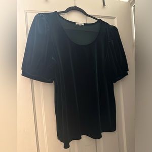 Green velvet blouse. Maurice’s brand. Emerald green in color. Size Large.
